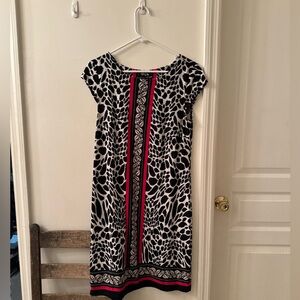 Leopard print dress with colorful accent.